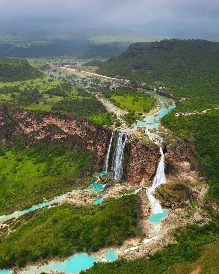 Wadi Darbat waterfall during Khareef season Salalah Oman