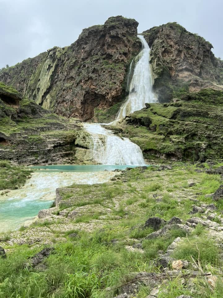 Wadi Darbat waterfall during Khareef season Salalah Oman
